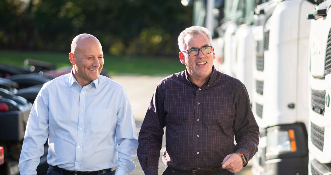 Scania colleague sat at table in meeting room