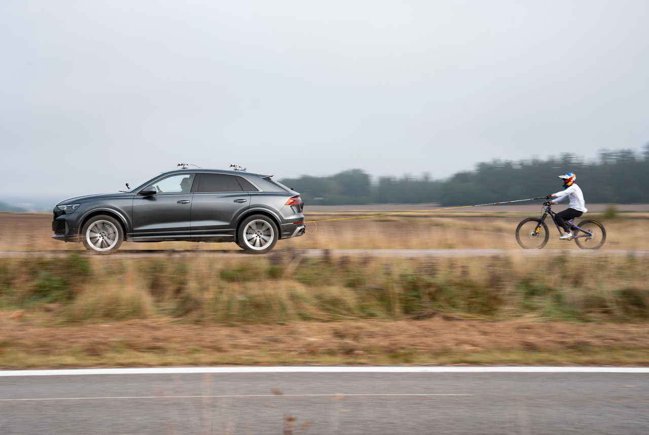 Matt Jones being pulled by Audi RSQ8
