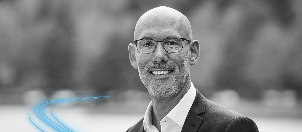 A portrait of Kristoffer Nyberg in black and white.