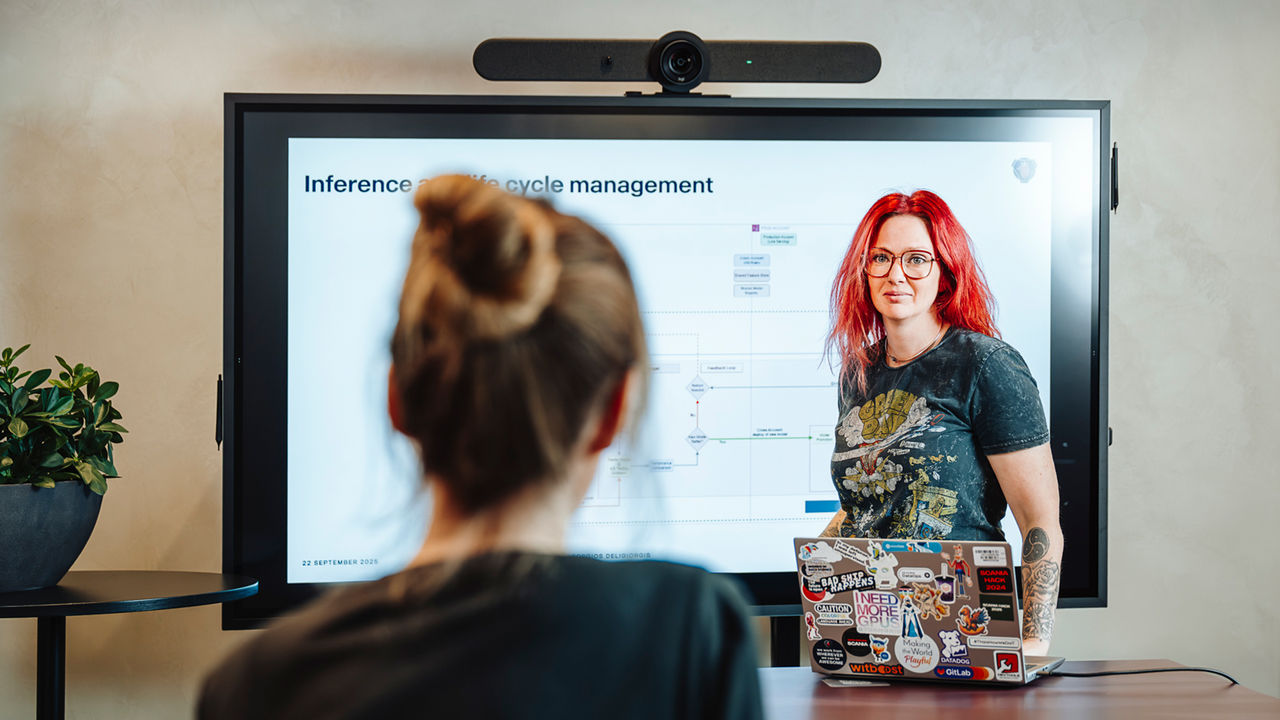 Julia Lautin, Data Scientist at Scania, presenting at a meeting.